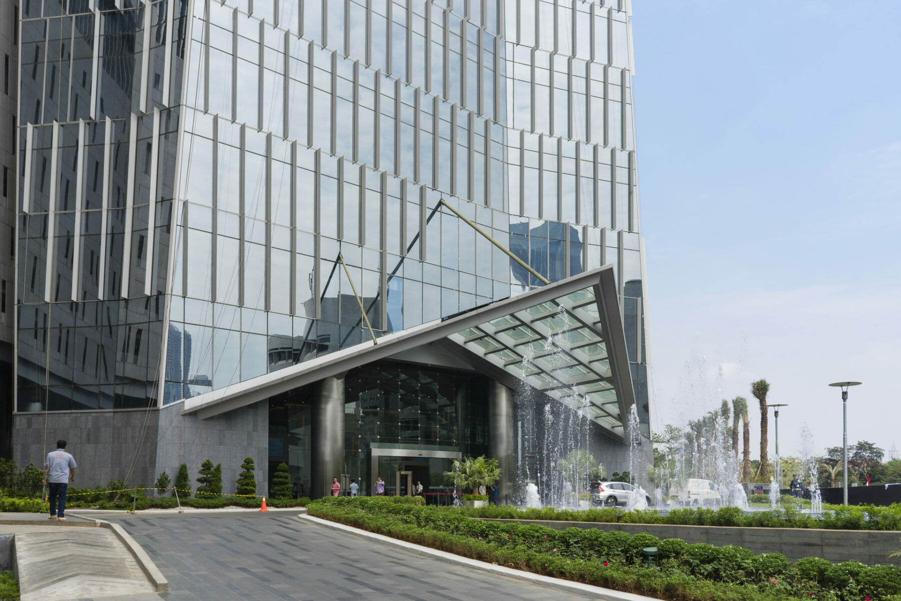 Exterior entry of Telkom Lanndmark Tower. The tower’s circumferential form is determined by the dynamic site conditions and surrounding view corridors and, as it rises, transforms into a four-cornered crown.