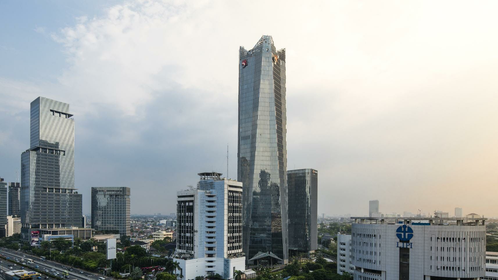 Standing at 220 meters in height, the Telkom Landmark Tower sits amidst two other buildings named Telkomsel Smart office.